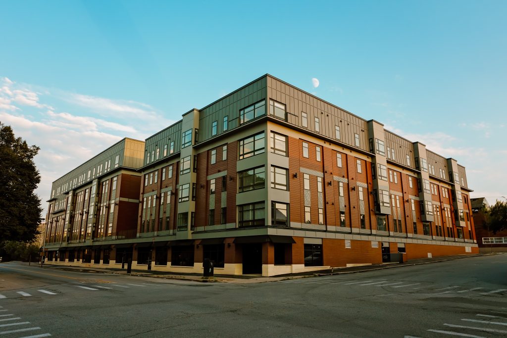 a photo of a building with a blue sky, by concord nh photographer danica b photography - real estate