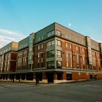 a photo of a building with a blue sky, by concord nh photographer danica b photography - real estate