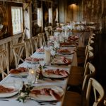 wedding photography bishop farms weddings and events new hampshire wedding venue table decor set up candles plates dinner