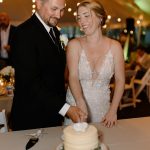 wedding photography bride and groom cutting cake new hampshire