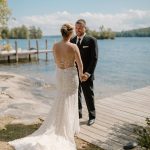 wedding photography bride and groom holding hands squam lake new hampshire