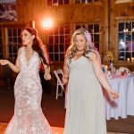 wedding photography bridal party dancing at reception at Pike's Peek venue new hampshire bride and daughter dancing