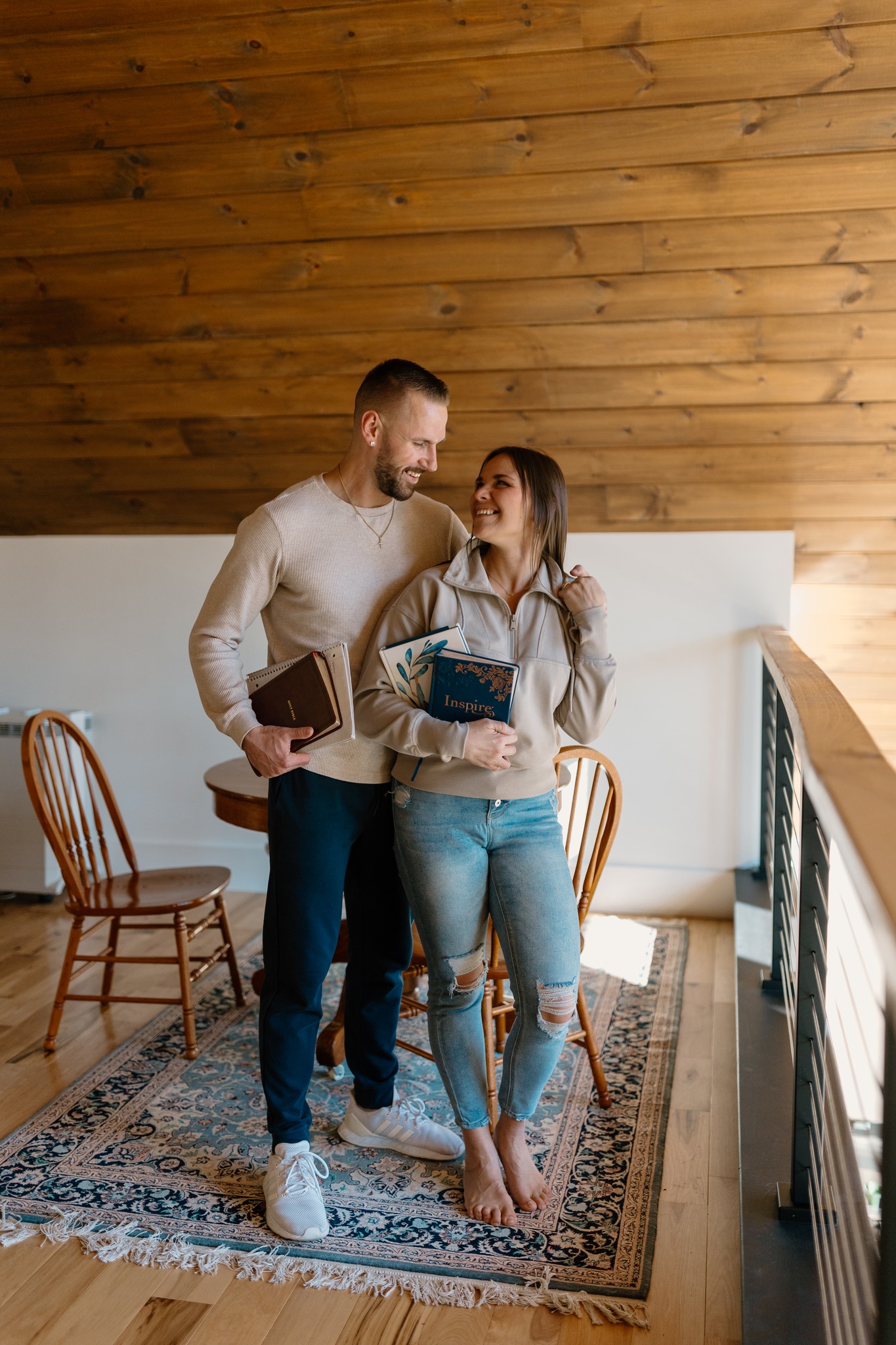 couples portrait husband and white portrait photography in home lifestyle wood ceiling bible study love concord new hampshire branding business