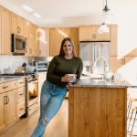 couples portrait husband and white portrait photography in home lifestyle wood ceiling bible study love concord new hampshire branding business kitchen