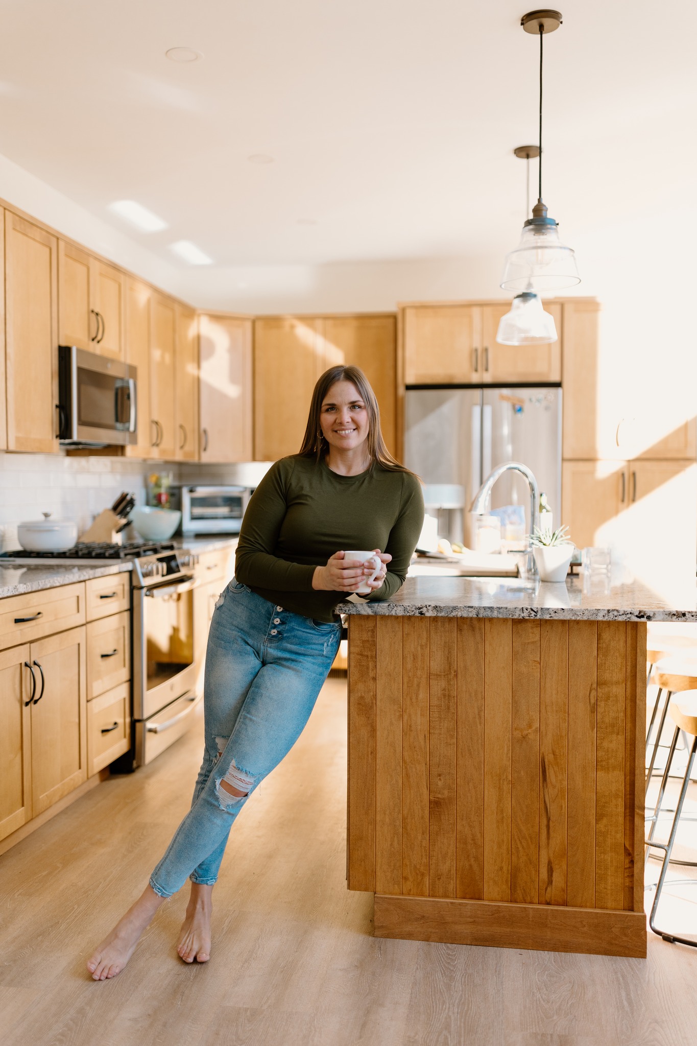 couples portrait husband and white portrait photography in home lifestyle wood ceiling bible study love concord new hampshire branding business kitchen