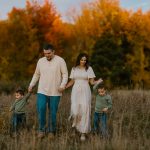 family portrait photography brother sister mom dad hugging snuggling outside sunset golden hour concord new hampshire