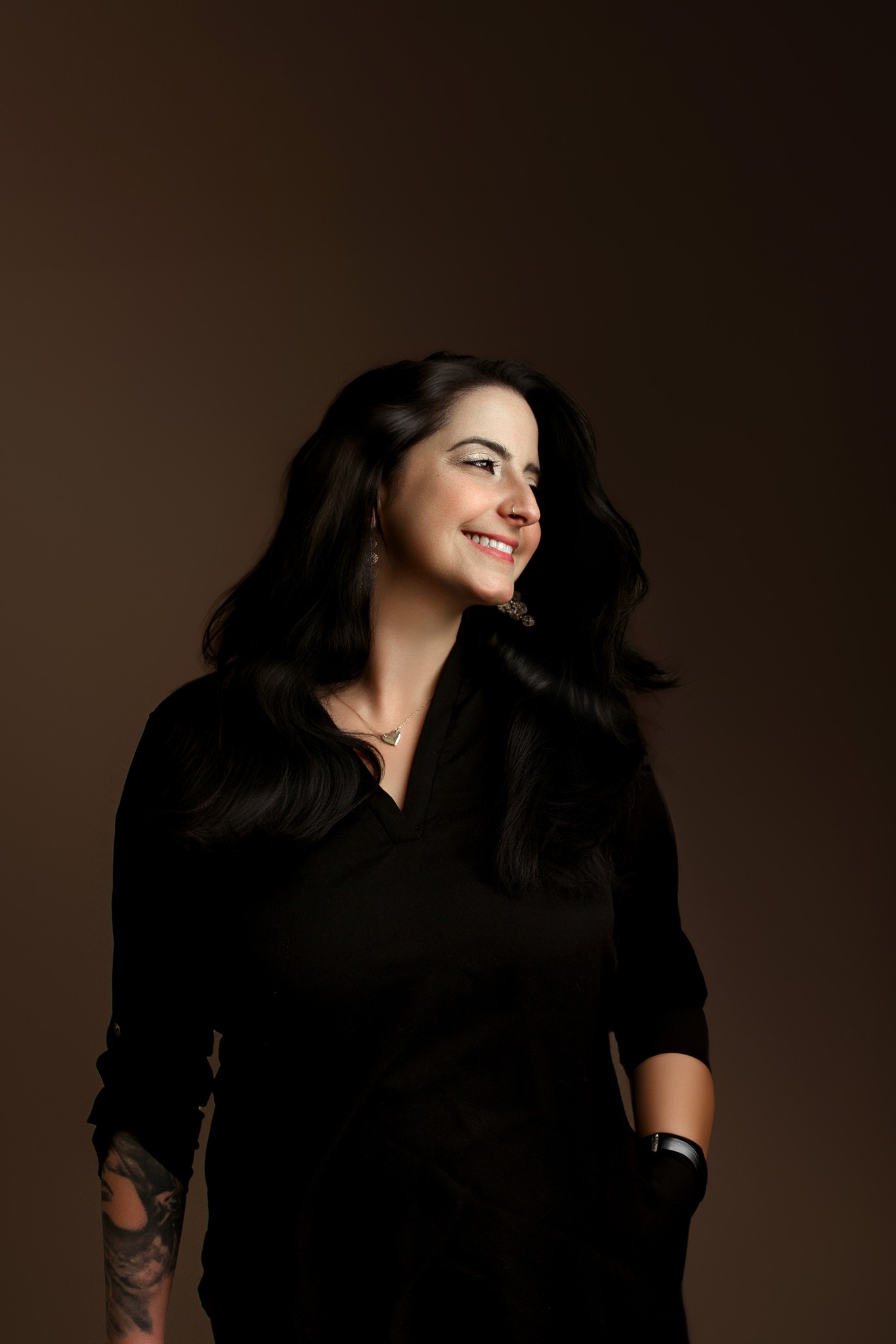 headshot portrit photography woman black shirt long hair brown solid backdrop smiling concord new hampshire studio professional business portrait