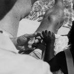 black and white family portrait holding hands pool concord new hampshire