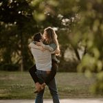 engagement photography couple portrait long grass sunset gilford new hampshire flowers white dress