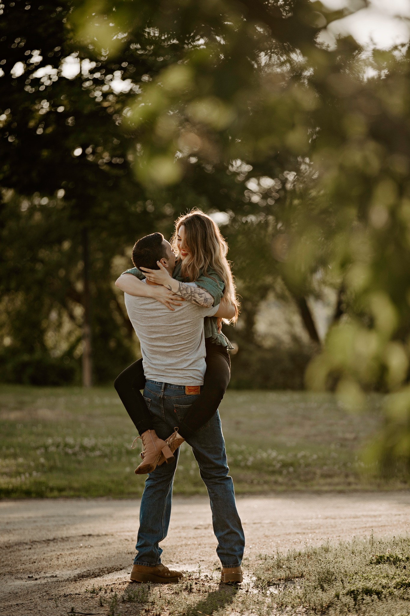 engagement photography couple portrait long grass sunset gilford new hampshire flowers white dress