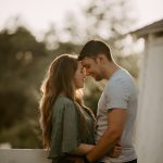 engagement photography couple portrait long grass sunset gilford new hampshire flowers white dress