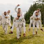 wedding photography coleman state park new hampshire bride and groom sitting in adirondack chairs on farmers porch sunset golden hour wedding dress dancing black and white groomsmen