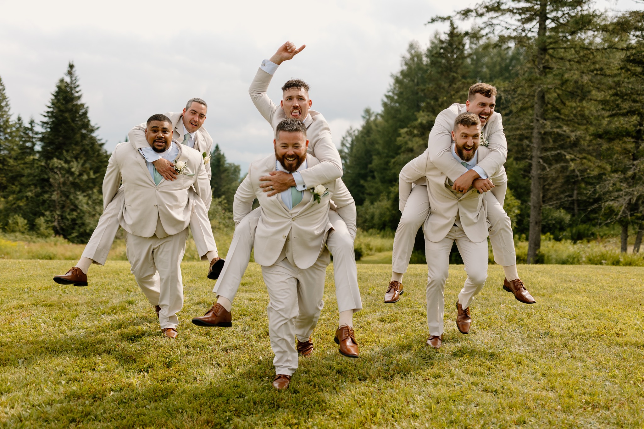 wedding photography coleman state park new hampshire bride and groom sitting in adirondack chairs on farmers porch sunset golden hour wedding dress dancing black and white groomsmen