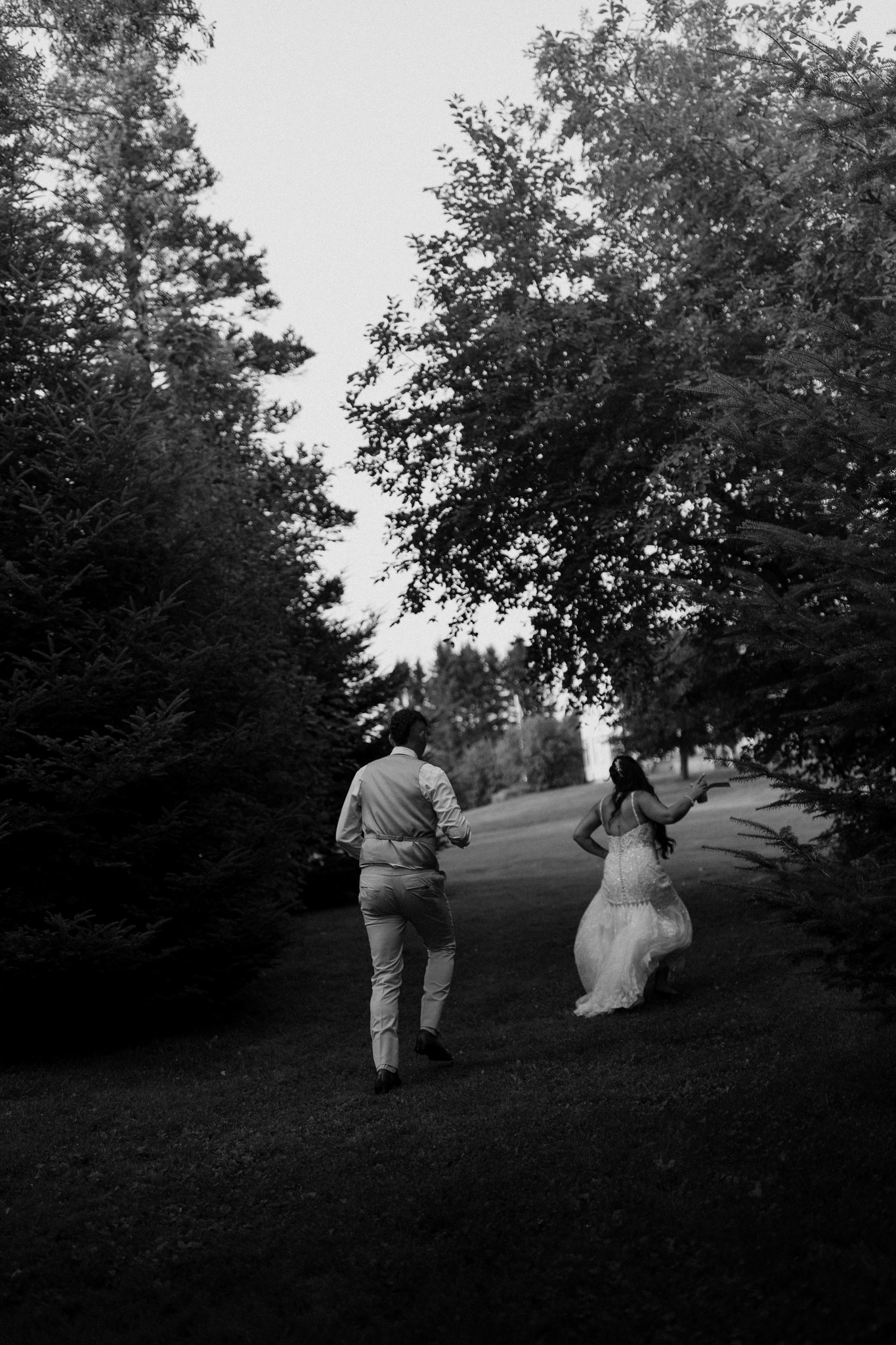 wedding photography coleman state park new hampshire bride and groom sitting in adirondack chairs on farmers porch sunset golden hour wedding dress dancing black and white