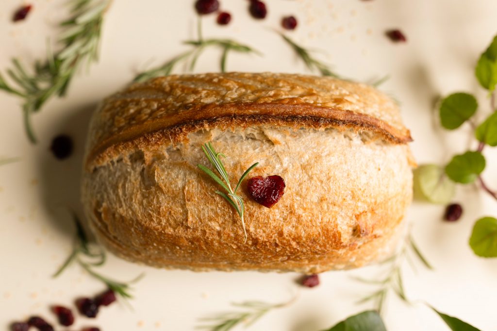 Discover Chasing Birds Bread, a local sourdough bakery in Laconia, NH, and go behind the scenes of this Lakes Region small business through branding photography.