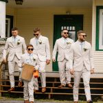 wedding portrait of groomsmen and ring bearer, walking towards the ceremony, nh
