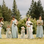 wedding portrait of bridesmaids and flower girls standing at alter, nh