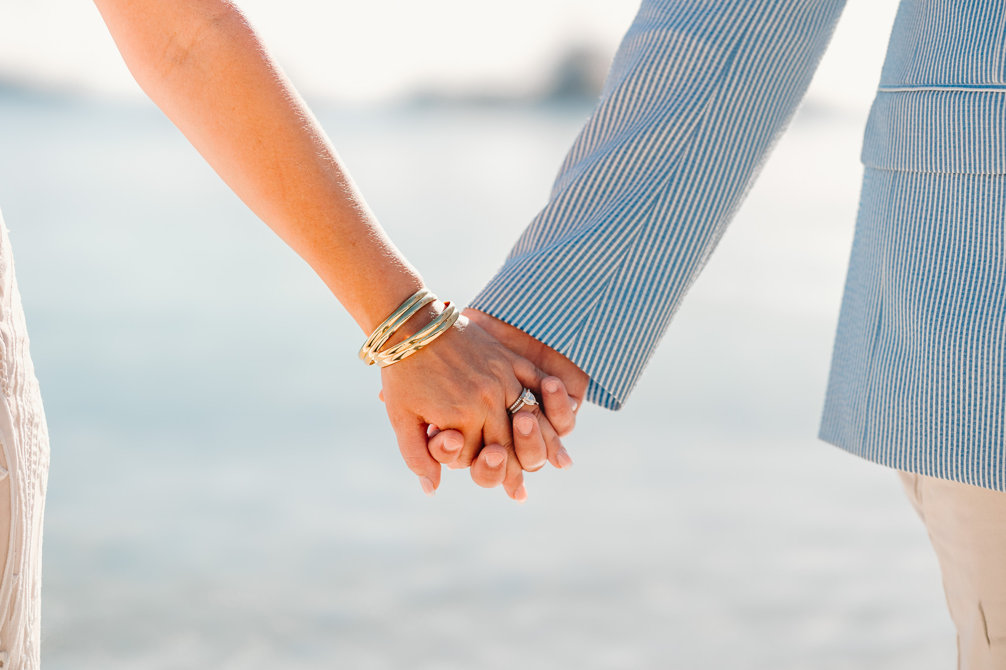 Bride and groom exchange vows during a beach wedding ceremony on Water Island, St. Thomas, USVI, surrounded by tropical ocean views.